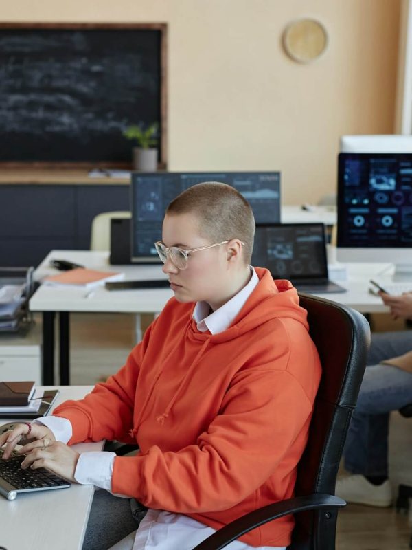 side-view-of-young-busy-female-specialist-in-cyber-security-networking.jpg